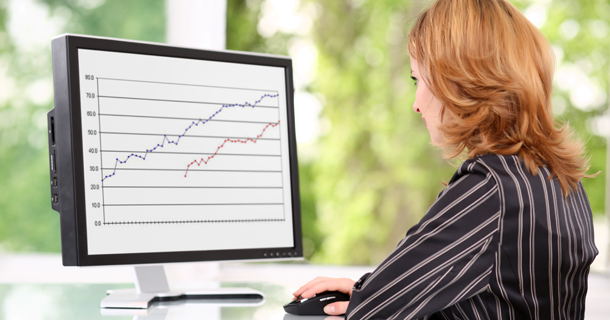 woman viewing chart on computer screen