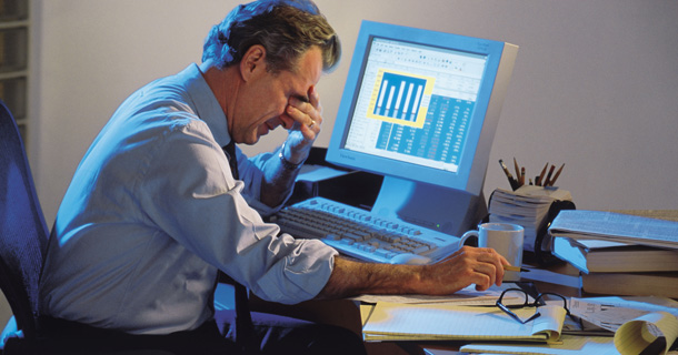 Stressed-out Man at Computer