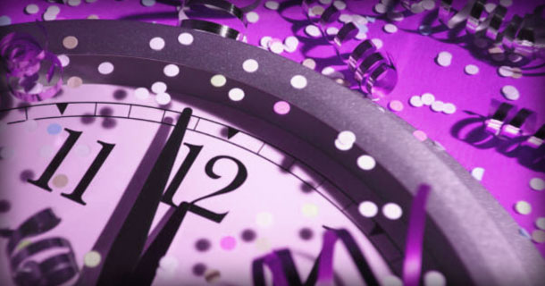 A Clock Striking Midnight and Confetti