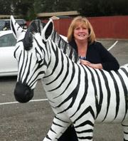 Agent Laurie Way with a Zebra