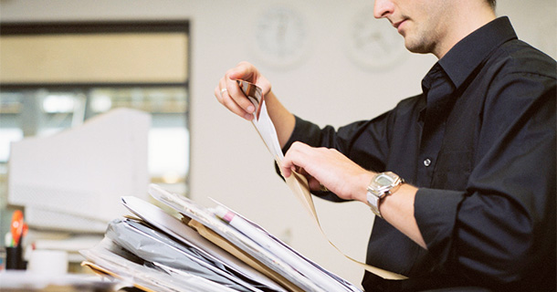 Man opening mail