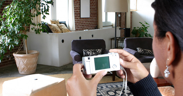 woman photographing home