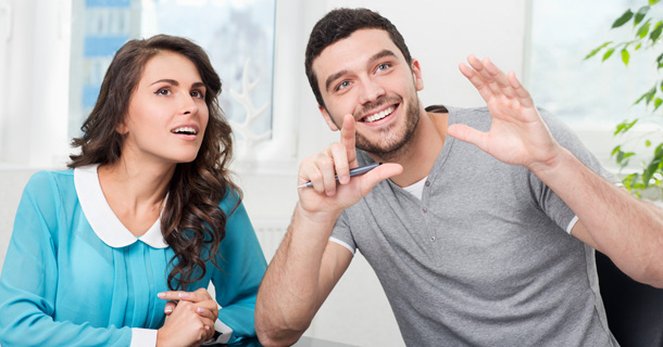 two people talking with hand guestures