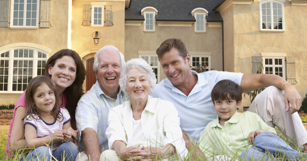 mulit-generation family in front of home